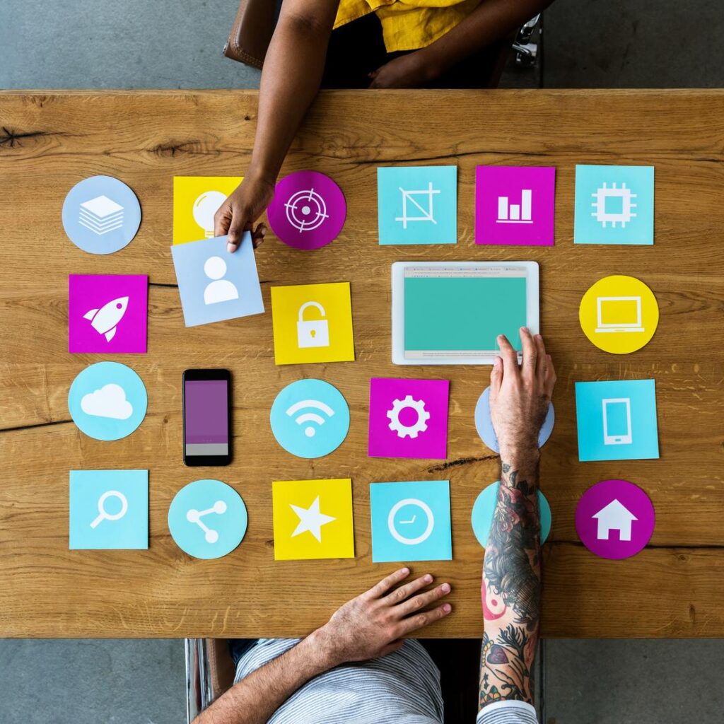Group Of Computer Icon On The Wooden Table P77YUSB 1024x1024
